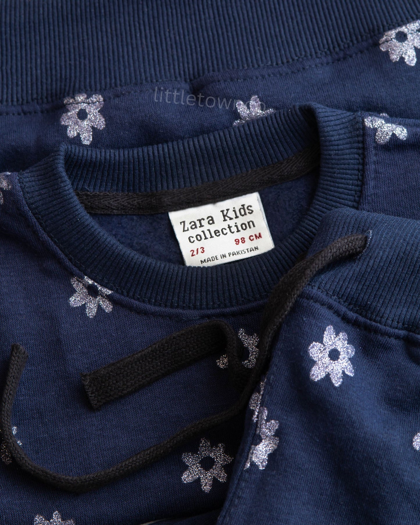 Navy blue fleece tracksuit with glittered flowers