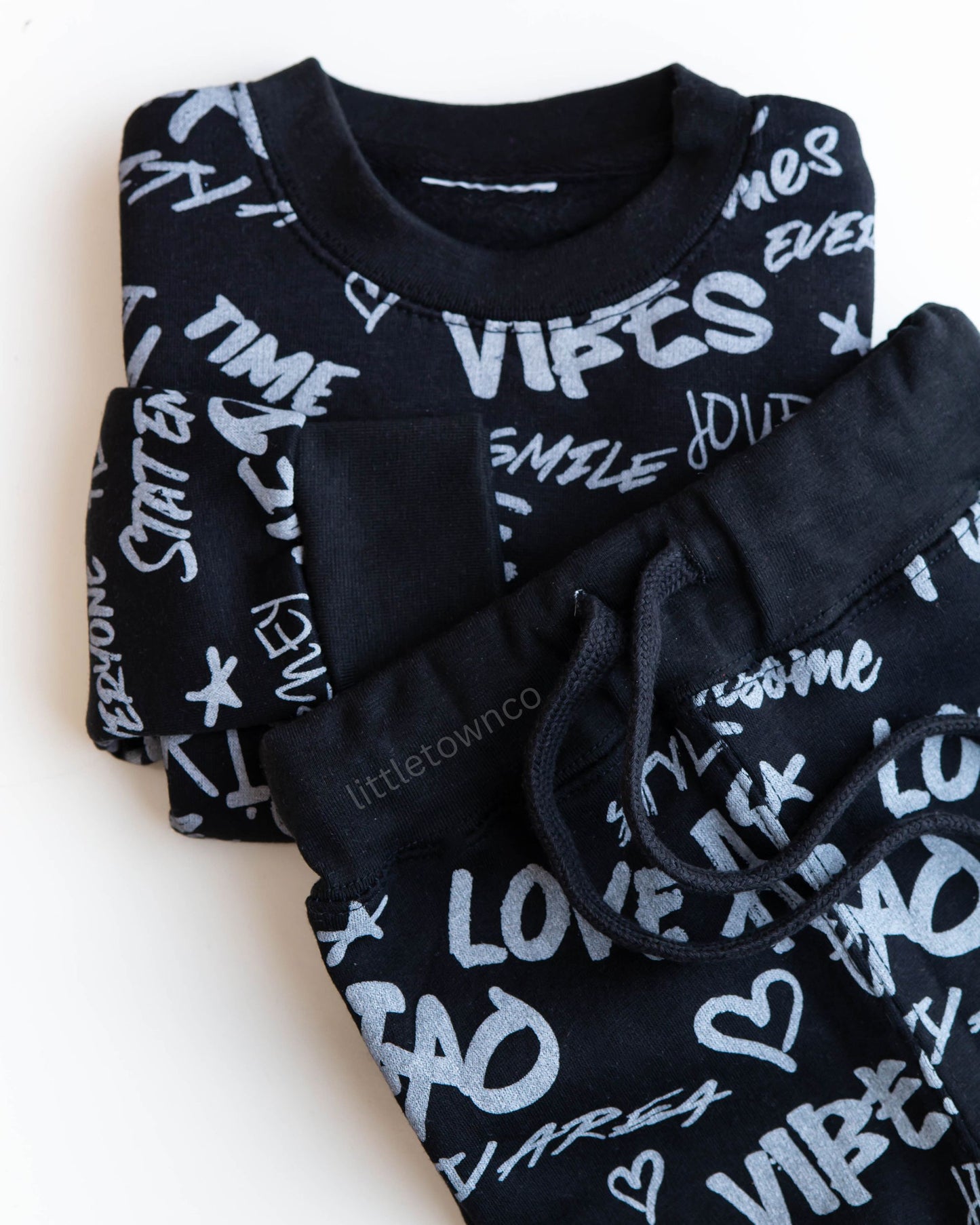 Black colour fleece tracksuit with grey text