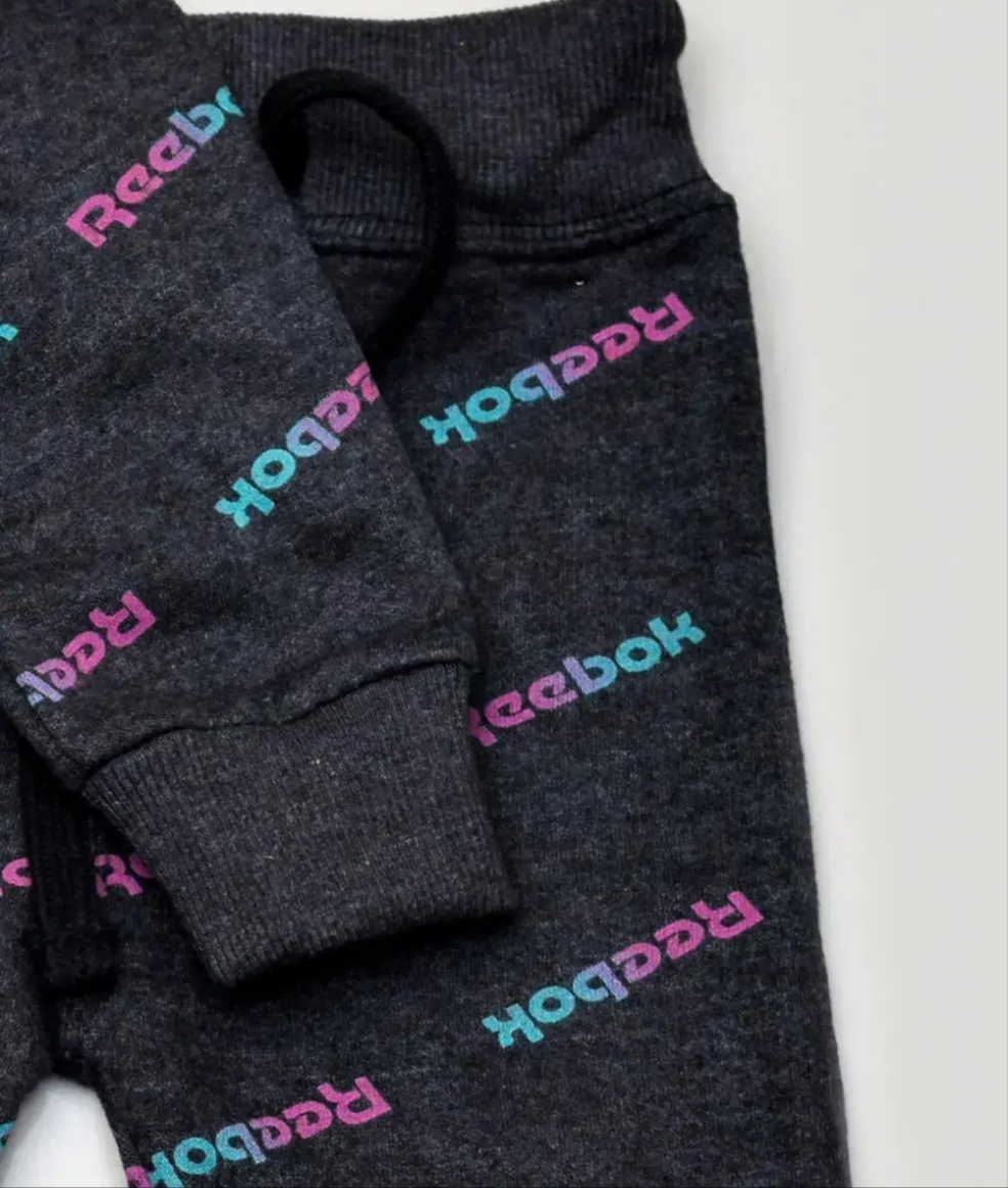 Reebok text print dark grey tracksuit Unisex