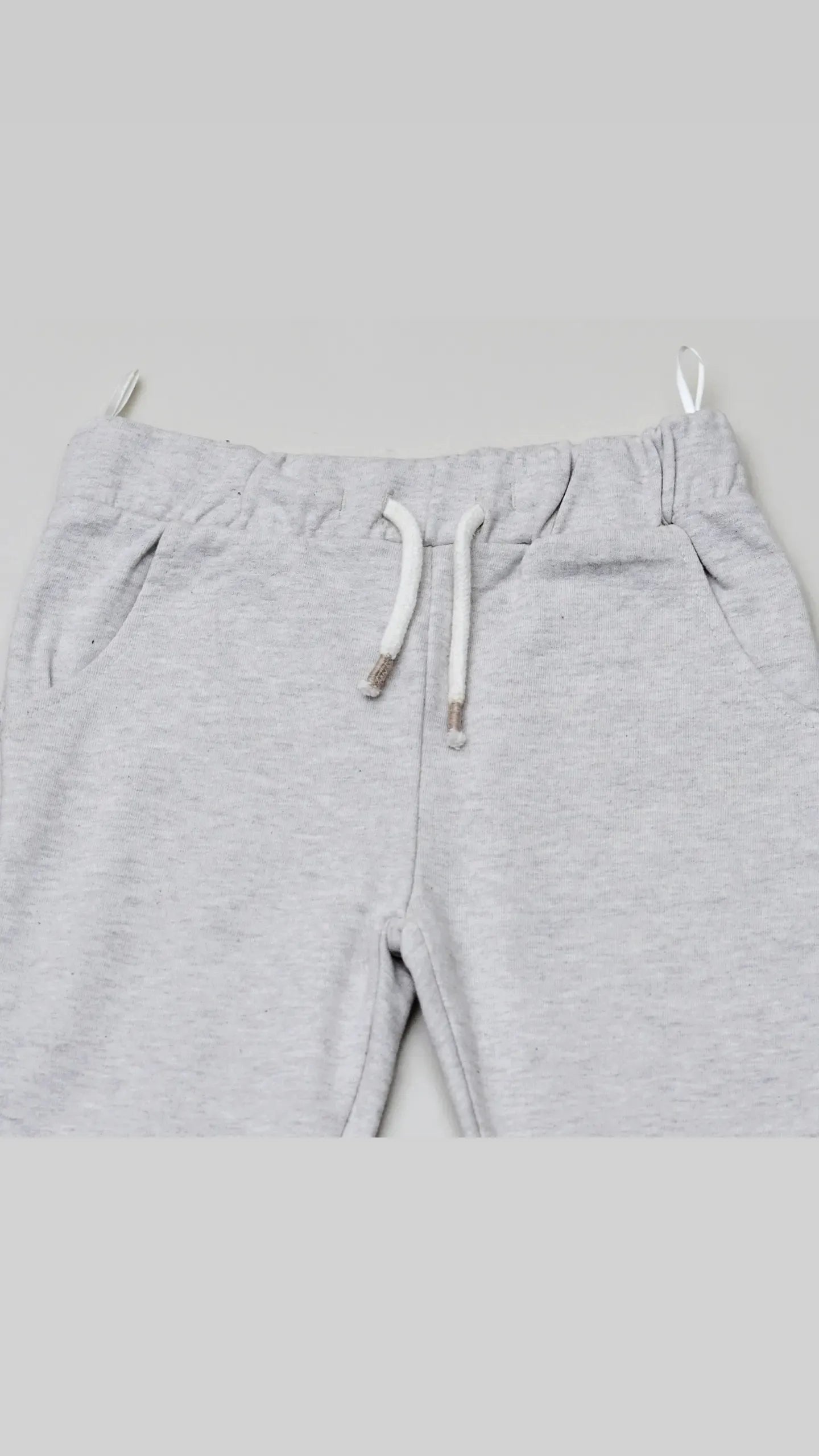 Grayish white fleece trousers
