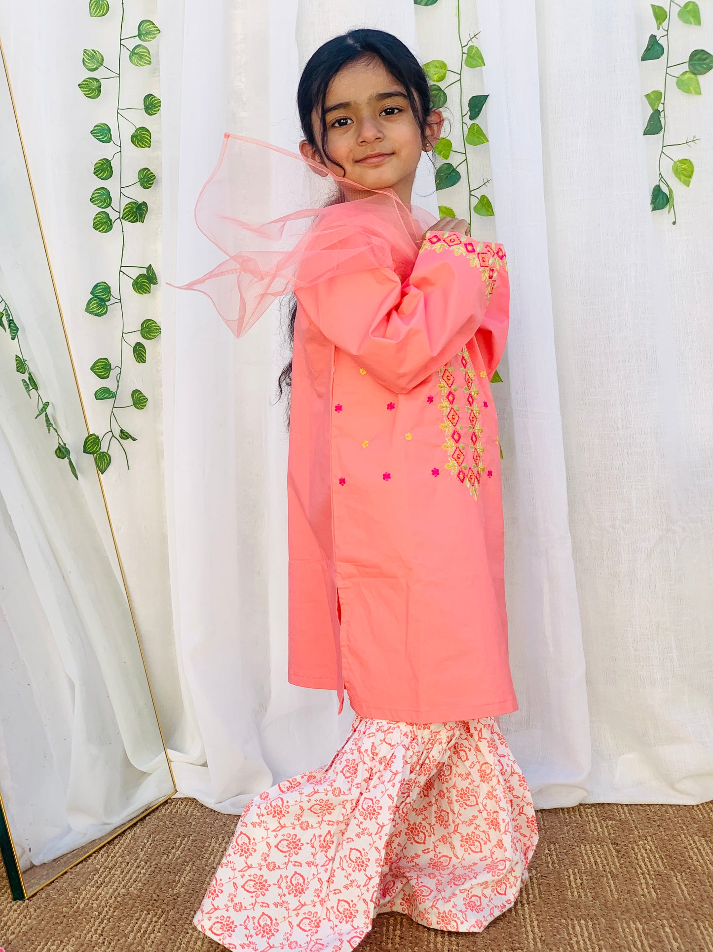A Qaswa Embroided Orange cotton gharara 3pc dress